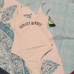 White “sunset bandit” one piece bathing suit